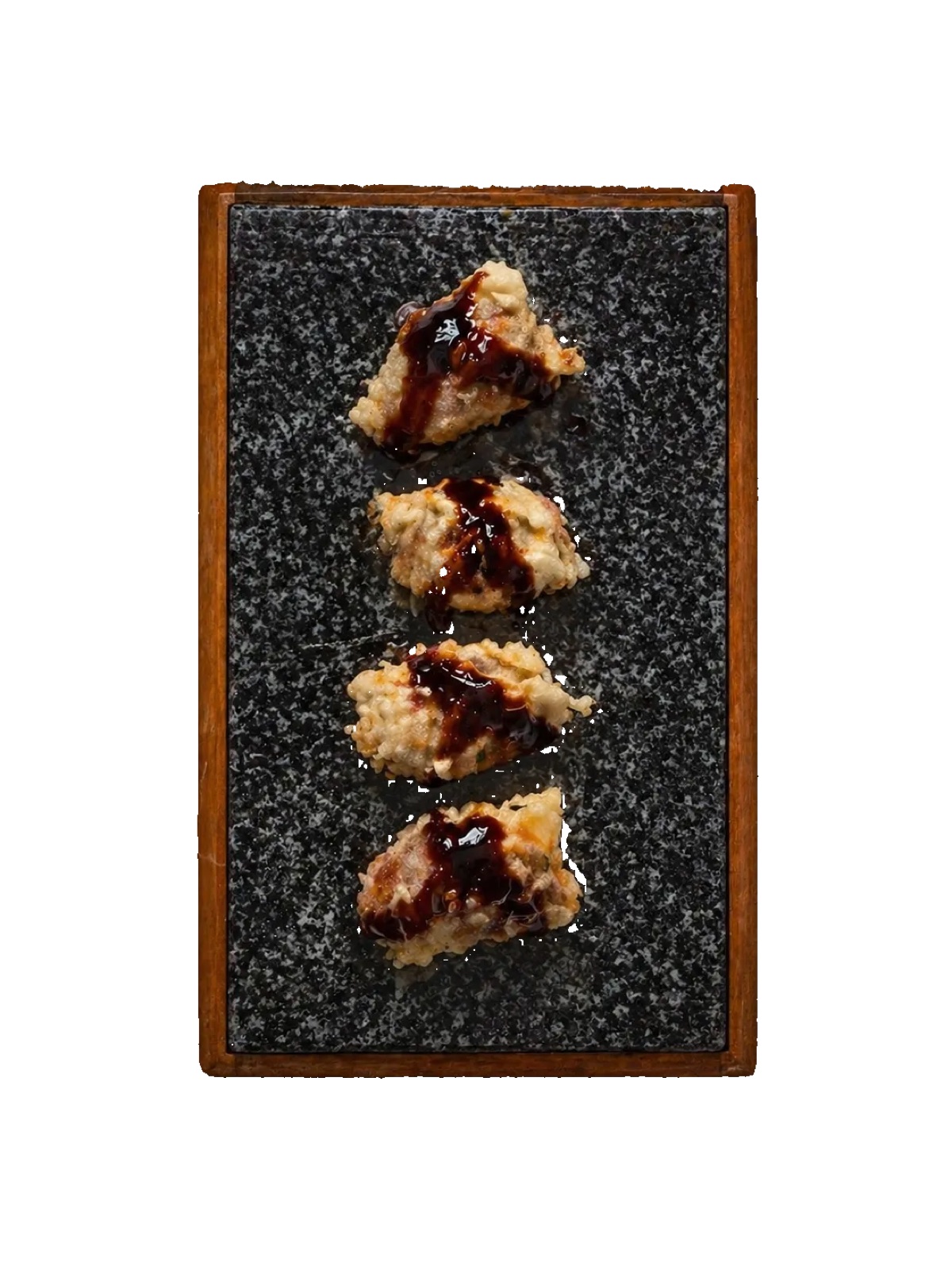 Bocconcini di wagyu in tempura su pietra nera